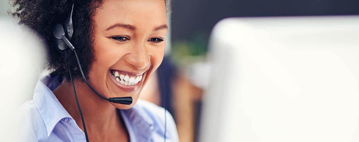 photo of woman with a phone headset on